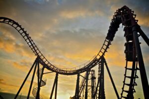 A roller coaster during the evening